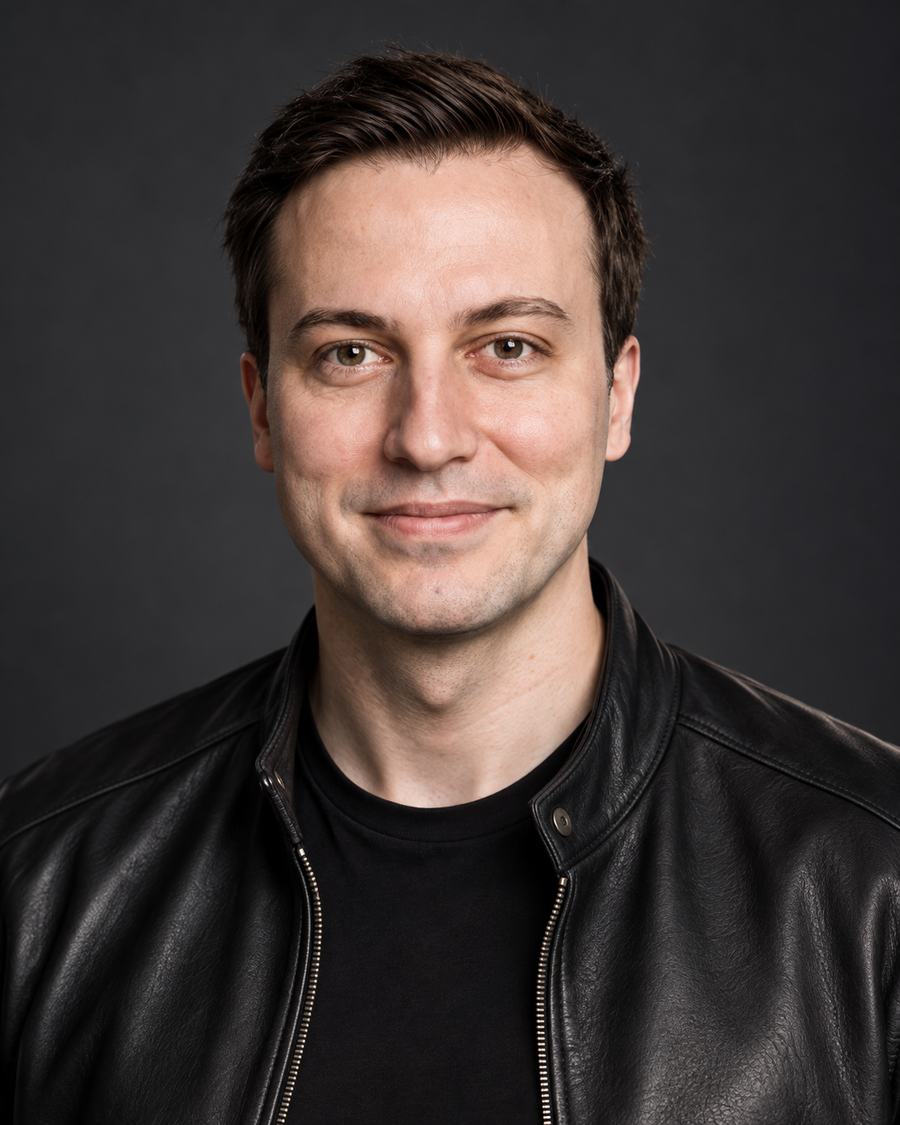 Studio portrait of Dobromir Kraychev in a black leather jacket